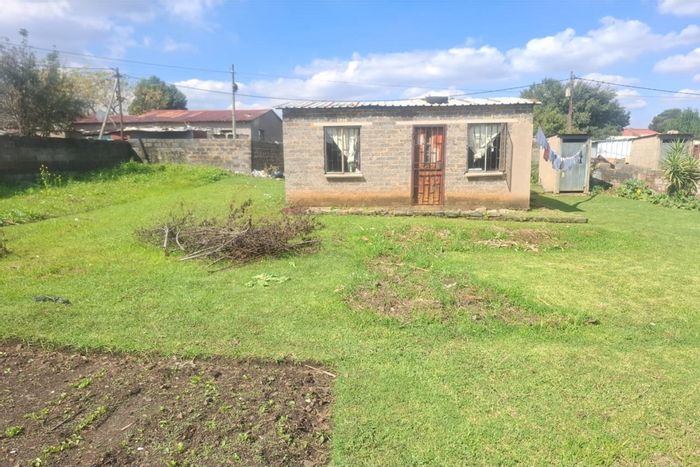 House For Sale in Etwatwa: 2 Bedrooms, 1 Bathroom, Prime Location for Business or Home.
