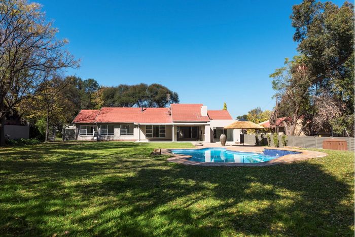 Fourways House For Sale: 4 bedrooms, pool, cottage, and spacious entertainment areas.