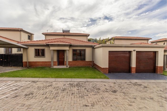 For Sale: Noordwyk Townhouse with 4 bedrooms, pet-friendly, secure complex amenities.