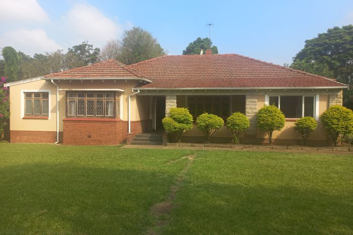 For Sale: House in Scottsville with 5 bedrooms, 2 baths, and ample parking.