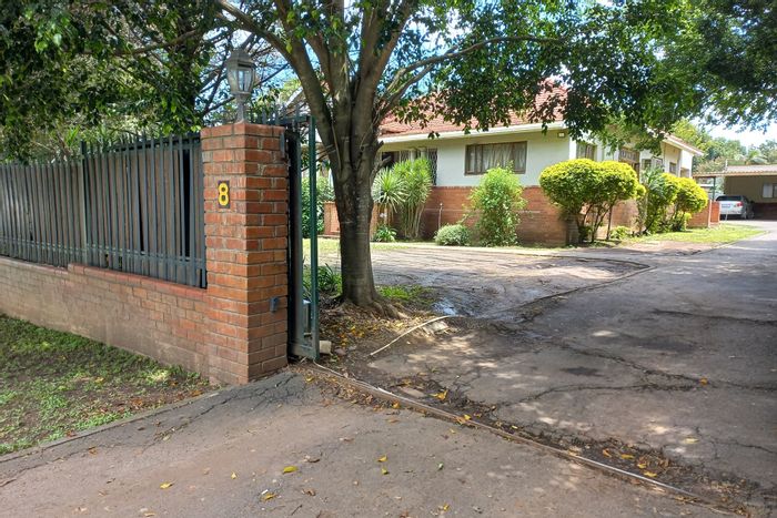 For Sale: House in Scottsville with pool, garden, and rental income potential.