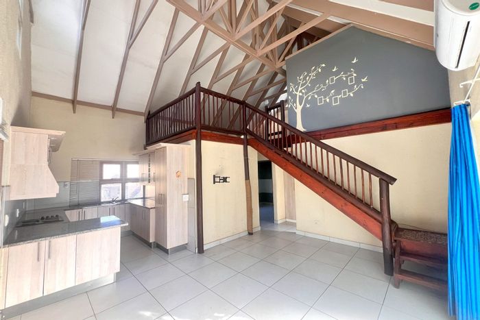 3-Bedroom Townhouse To Rent in West Acres with communal pool and flexible loft space.