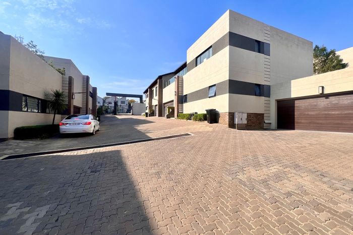 Bryanston Townhouse For Sale: 3 beds, private garden, secure complex, close to amenities.