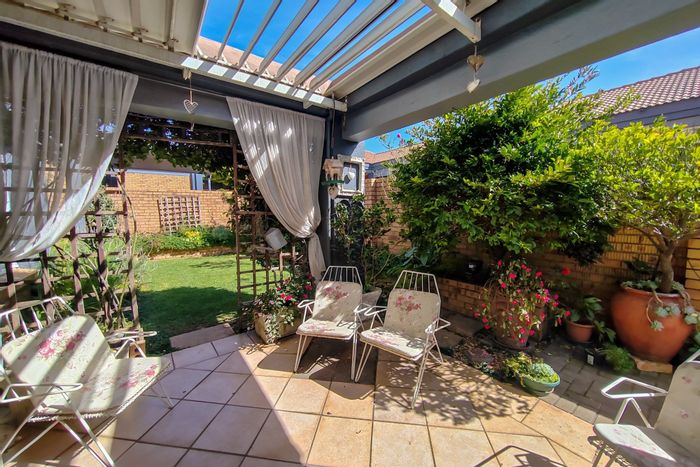 For Sale: Townhouse in Aerorand with 3 bedrooms, double garage, and serene garden.