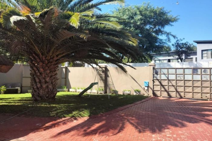 Spacious Oriel house for sale: 4 bedrooms, large garden, ample parking.