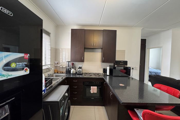 For Sale: 2-Bedroom Apartment in Carlswald with Pool, Tennis Court, and Secure Living.