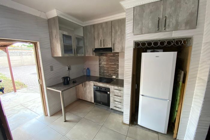 For Sale: Townhouse in New Park with 2 bedrooms, storage, and nearby amenities.