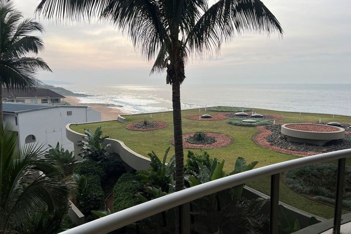 For Sale: Apartment at Compensation Beach with beachfront access, security, and income potential.