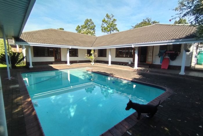 For Sale: House in Panorama with pool, garage, playroom, and security features.