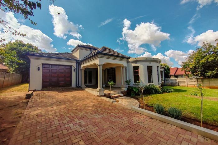 For Sale: 4-Bedroom House in Dennesig with garage, braai area, and fireplaces.