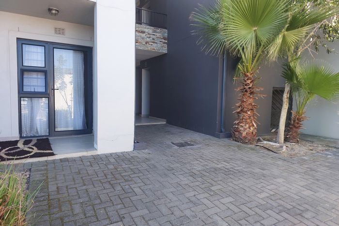For Sale: 2-Bedroom Apartment in Parklands North with security and ample storage.
