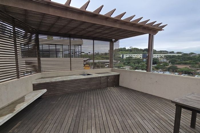 For Sale: Apartment in Ballito Commercial District with rooftop pool and entertainment area.