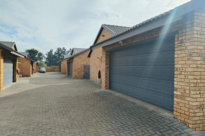 For Sale: Vaalpark Townhouse with 3 bedrooms, garden, and secure complex.
