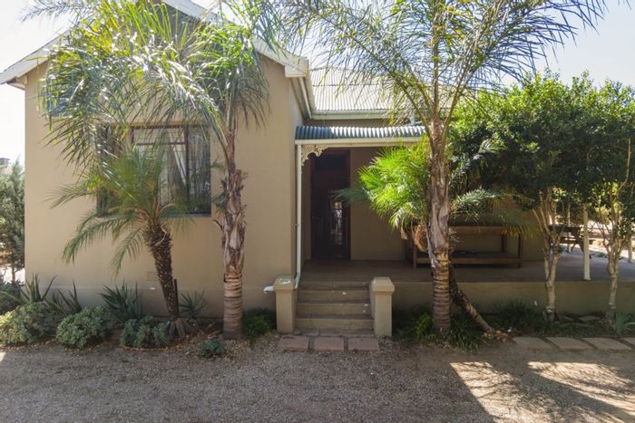 For Sale: Spacious 8-bedroom house in Moorreesburg Central with dual kitchens and en-suites.