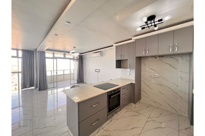 South Beach Apartment For Sale: 1.5 bedrooms, pool, balcony, secure parking.