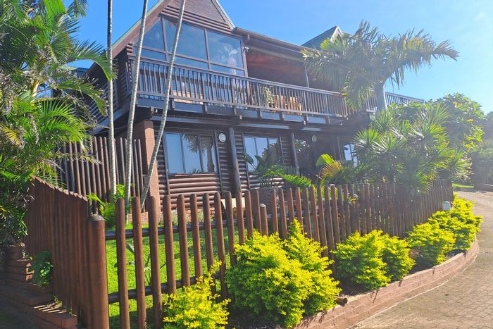 For Sale: Spacious Palm Beach Townhouse with ocean views, dual living, and security.
