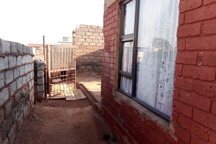 House for Sale in Tsakane Ext 12: 2 bedrooms, outside toilet, rental income potential.