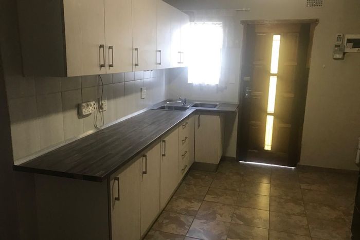 2 Bedroom Apartment To Rent in Impala Park with shared entrance and carport.