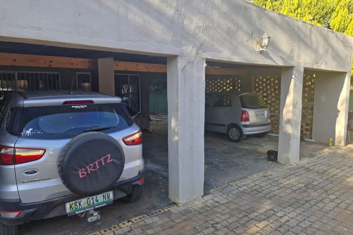 For Sale: 4-bedroom house in Wilkoppies with pool, garden, and ample parking.