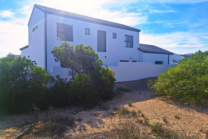 For Sale: House in Shelley Point with golf access, beaches, and eco-friendly features.