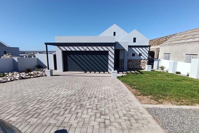 Laguna Sands Townhouse For Sale: 3 bedrooms, double garage, near beach and amenities.