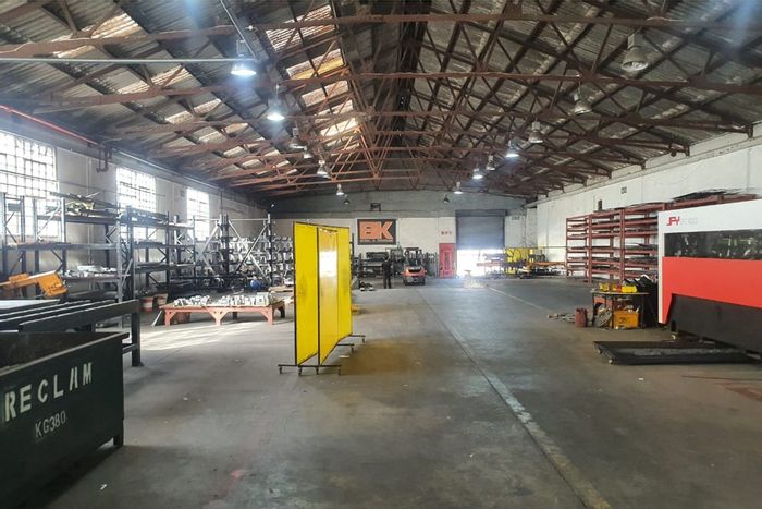 Industrial facility in Deal Party to rent, featuring ample yard and office space.
