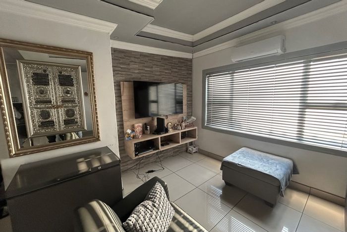 For Sale: New Modder House with 3 homes, ample parking, and secure living.