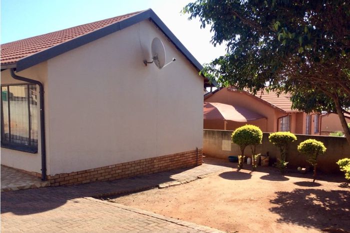 3-bedroom house in Tlhabane West for sale, ample parking and pet-friendly yard.