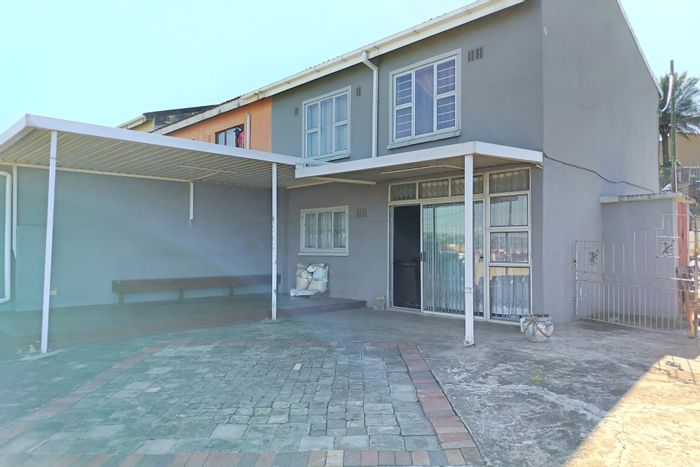 For Sale: Westham Townhouse with dual entrances, large entertainment area, and parking for 6.