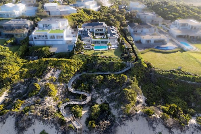 For Sale: Beachfront House at Whale Rock Beach with private access, pools, and security.