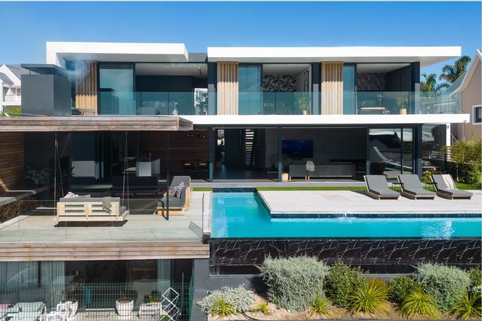 For Sale: Myburgh Park House with lagoon views, smart tech, and entertainment spaces.