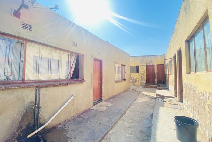 For Sale: Spacious 11-bedroom house in Tembisa Central with rental income potential.
