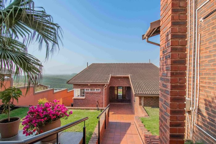 For Sale: House in Reservoir Hills with pool, cottage, and spacious entertainment areas.