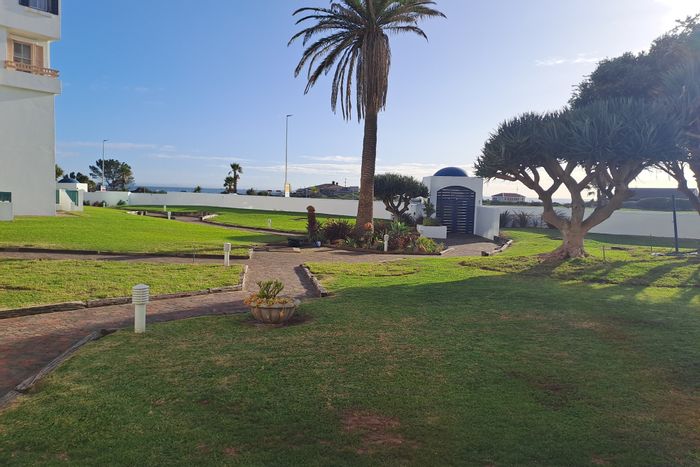 For Sale: Apartment in Summerstrand with beach access, private veranda, and parking.