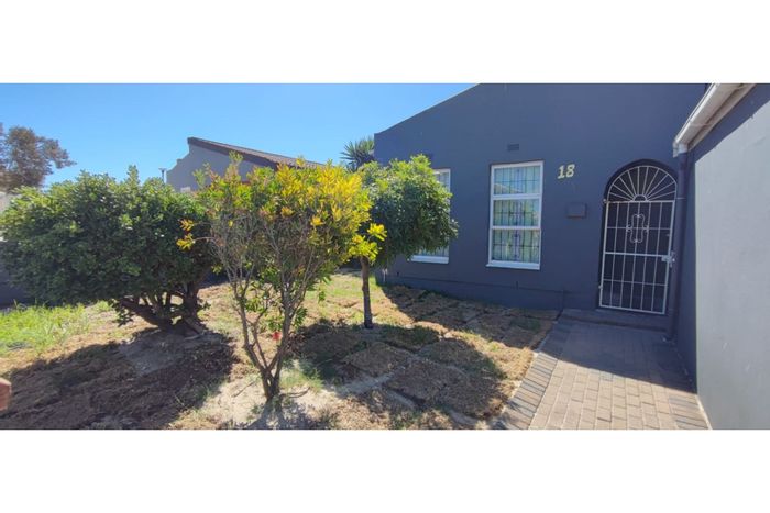 3-Bedroom House To Rent in Strandfontein Central with garden and garage.