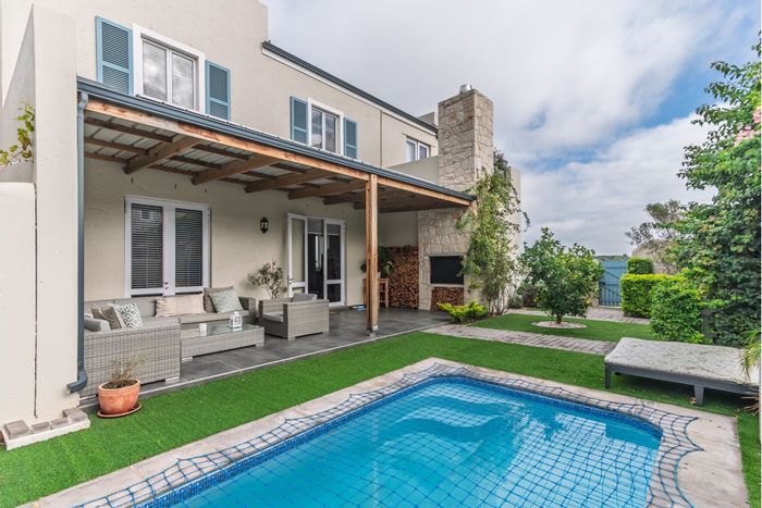 For Sale: House in Nooitgedacht Village with pool, solar power, and outdoor amenities.