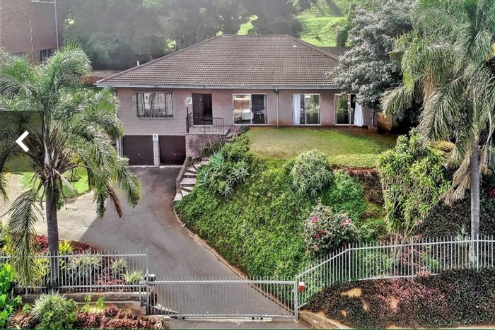 Income-generating house with 7 sections and ample parking in Glenwood For Sale.