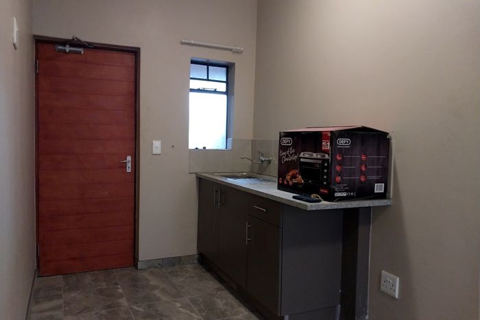 2-Bedroom Apartment in Scottsdene To Rent with Security, Parking, and Community Amenities.