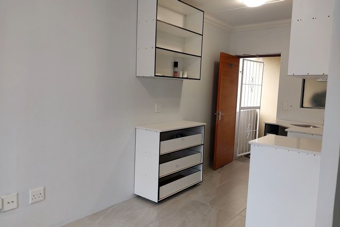 2-Bedroom Apartment in Scottsdene To Rent, includes parking, security, and amenities.