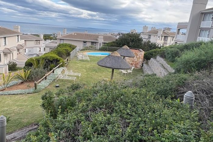 For Sale: Townhouse in Pinnacle Point Golf Estate, 3 beds, sea views, garage.
