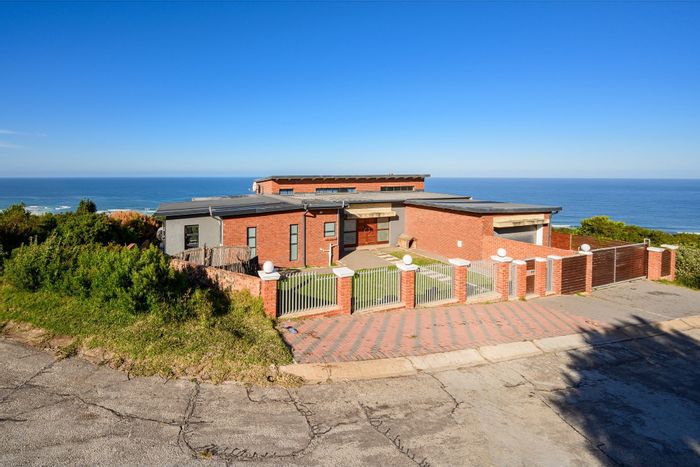 House for Sale in Blue Horizon Bay: Ocean views, gym, patio, and beach access.