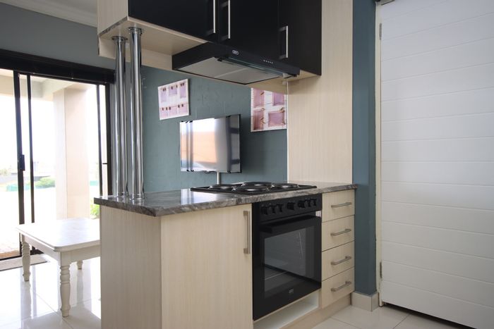 2-Bedroom Apartment To Rent in Winterstrand with Veranda and Secure Parking.
