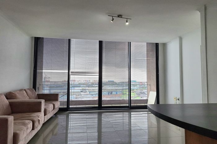 1-Bedroom Apartment To Rent in Woodstock with secure parking and 24/7 security.