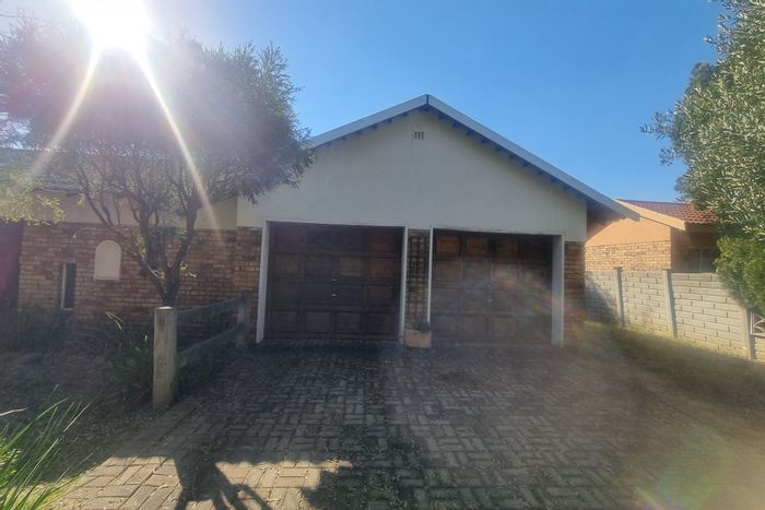La Hoff House For Sale: Spacious living, double garage, large yard, renovation potential.