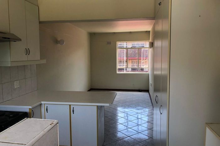 2-bedroom apartment in Impala Park with secure complex, play areas, and parking.