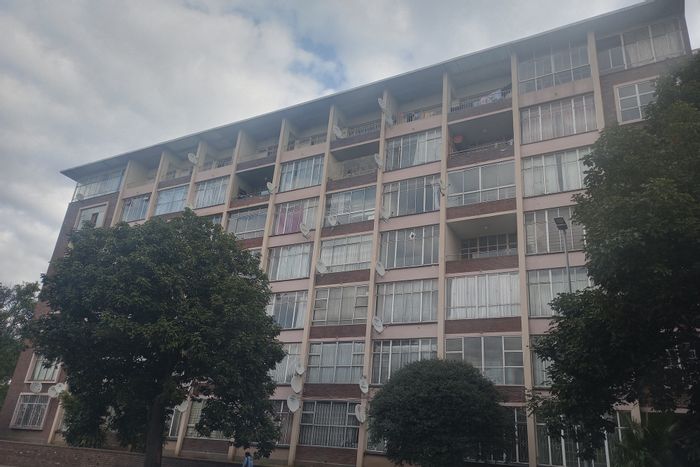 For Sale: Apartment in Pietermaritzburg Central with 2 bedrooms, parking, and city views.