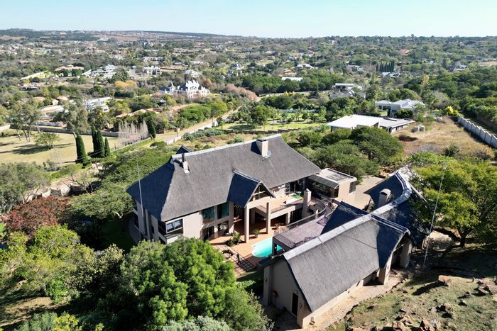 For Sale: Spacious 5-Bedroom House in Mooikloof Equestrian Estate with Pool and Entertainment Areas.
