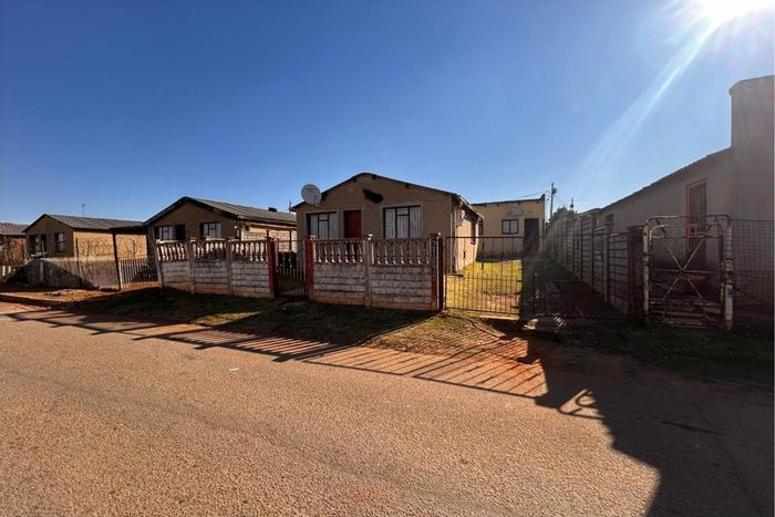 For Sale: House in Mofolo South with 2 bedrooms, spacious yard, and outside rooms.
