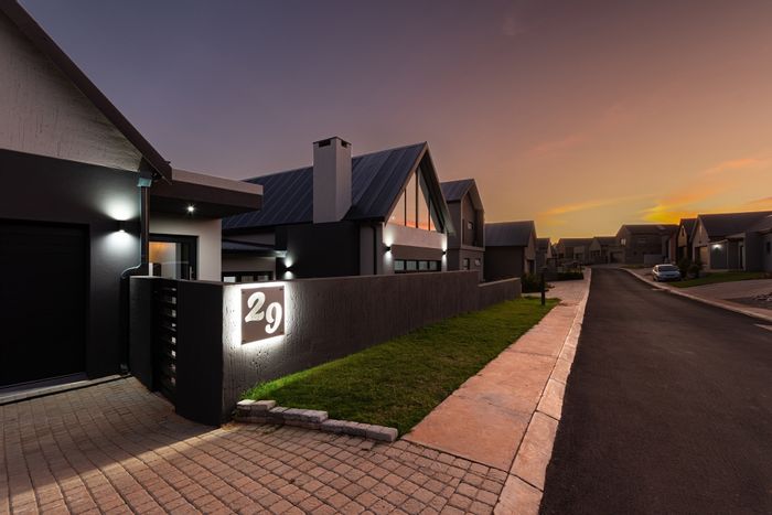 For Sale: House in Outeniquasbosch with 4 en-suite bedrooms, eco-friendly features.