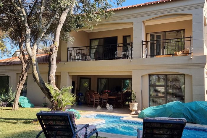 For Sale: House in WestLake Country & Safari Estate with pool, garden, and security.